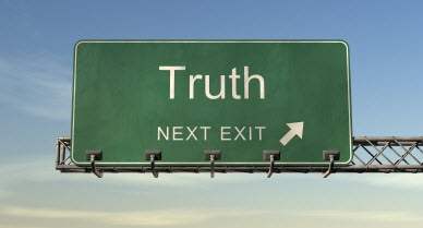 Picture of highway sign with "Truth" text and "Next Exit" with an arrow pointing to the right.