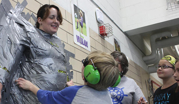 Principal Molly Raske Duct Tape Fundraiser