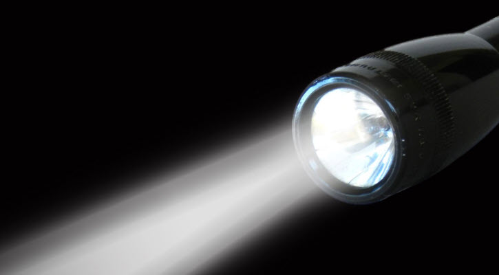 Man Charged After Blinding Helicopter Pilot with Flashlight