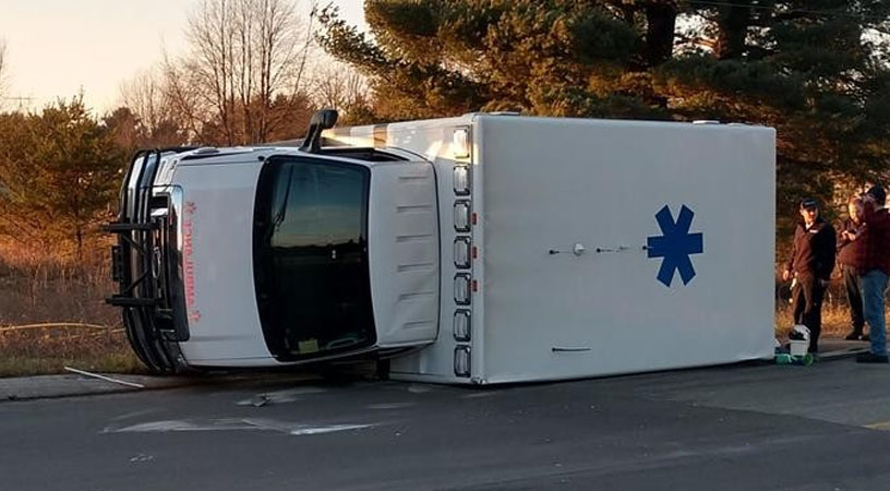 MANISTEE COUNTY, Mich. (WPBN/WGTU) -- A semi hauling logs crashed into a North Flight EMS ambulance Saturday afternoon, according to the Manistee County Sheriff's Office.